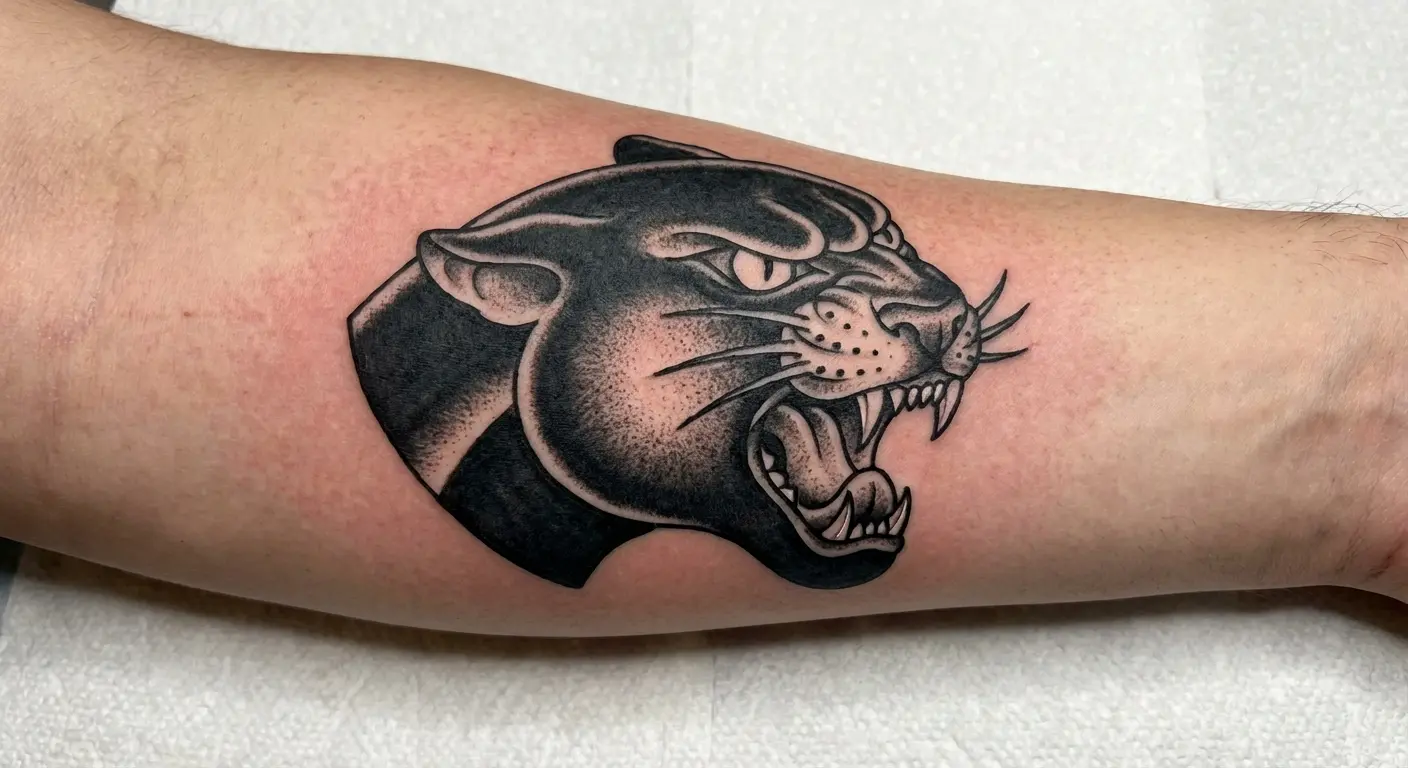 Traditional panther head tattoo